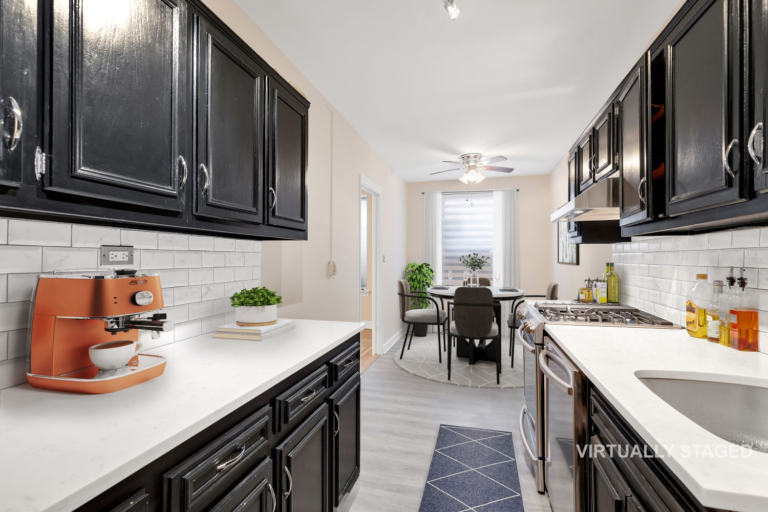 Galley kitchen with eat in dining area and stainless appliances, 8701 Shore Road Apt 131 one bedroom co-op Bay Ridge Brooklyn
