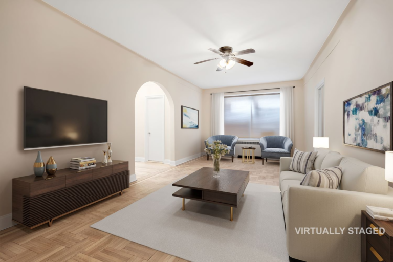 Parquet hardwood living room with prewar archway and large window, 8701 Shore Road Apt 131 one bedroom co-op Bay Ridge Brooklyn