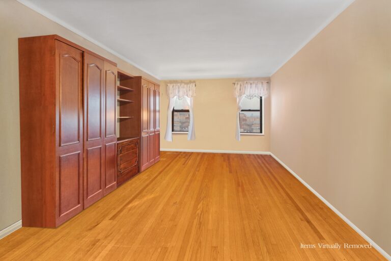 living room with built in wood closets and shelving at 359 Ovington Avenue Apt F6 in Bay Ridge, Brooklyn