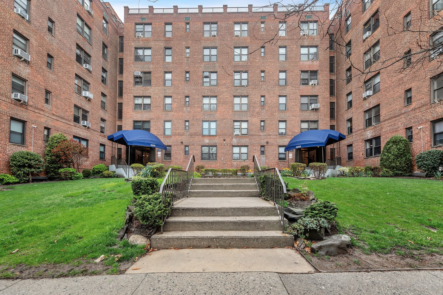 Courtyard entrances of The Oliver co-op at 9255 Shore Road in Bay Ridge, Brooklyn