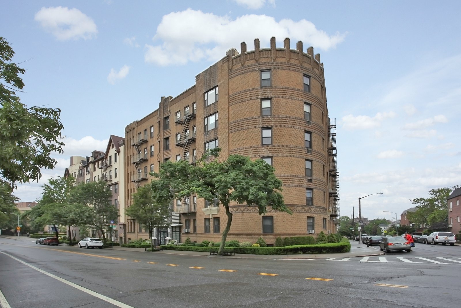 Prewar brick co-op building with a rounded corner tower at 7119 Shore Road in Bay Ridge, Brooklyn